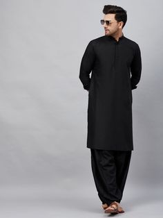 VM By VASTRAMAY Men's Black Cotton Blend Kurta and Patiala Set A sophisticated take on traditional wear, this VM By VASTRAMAY kurta and patiala set is sure to impress. A comfortable and stylish kurta pajama set, perfect for any occasion Key Features: Black, solid kurta with a straight knee-length cut Mandarin collar for a touch of elegance Long sleeves for a polished look Button placket for easy wear Straight hem for a clean silhouette Solid white patiala with a comfortable elasticated waistband Bollywood Style Black Kurta With Naqshi, Festive Semi-formal Cotton Traditional Wear, Black Semi-formal Kurta For Festive Occasions, Semi-formal Cotton Traditional Wear, Unstitched Straight Kurta Sets For Semi-formal Occasions, Semi-formal Straight Kurta For Diwali, Black Dabka Traditional Wear For Semi-formal Occasion, Unstitched Semi-formal Sets With Straight Kurta, Semi-formal Black Traditional Wear With Dabka