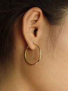 For Ready-to-ship items search here, https://etsy.me/39BDvMS 25 MM Minimalist Hoop Earring / Bridal Gift Gold Plated Hoop Earrings / Sterling Silver Hoop / Earrings Gift for Her Features- * Made to order * Materials: 925 Sterling Silver * Custom color: Rose Gold Plated, Yellow Gold Plated, and White Gold Plated * Hoop diameter: 25 mm. * Post thickness: 0.8 mm. * Layaway Plan Available - SKU : E13 Price is for a pair of earrings, if you only need one side please message me. All silver, gold or pl Gift Single Open Circle Hoop Earring, Simple Hoop Earrings For Gift, Simple Hoop Earrings As Gift, Gift Single Hoop Earring, Simple Single Hoop Earring, Simple Pierced Hoop Jewelry, Minimalist Tarnish Resistant Round Hoop Earrings, Simple Hoop Jewelry For Everyday, Gift Hoop Earrings With Open Circle