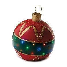 a red ornament with lights on it