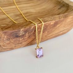 Amethyst Necklace, Tiny Lavender Amethyst Rectangle Pendant in Gold, February Birthstone, Minimalist Purple Layering Jewelry, Gift for her This simple dainty necklace features a tiny Pink Amethyst faceted baguette shape pendant prong set in 14k gold filled. The soft lavender purple pendant is suspended from a delicate cable chain. This is a 100% natural gemstone, full of healing properties. This necklace is simply perfect for everyday wear and is perfect for layering with other pieces in your co Amethyst Properties, Purple Pendant, Layering Jewelry, Amethyst Birthstone, Lavender Amethyst, Soft Lavender, Rectangle Pendant, Light Amethyst, Outfit Design