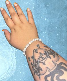 A Hand-Beaded Bracelet with cool tones of blue and white. Fits best on larger wrists. This bracelet is 1 of 1. Blue And White Fits, White Fits, Tones Of Blue, 1 Of 1, Cool Tones, Hand Beading, Arm Band, Beaded Bracelet, Beaded Jewelry