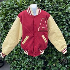 Maroon And Tan Letter Jacket New, Never Worn Fitted Varsity Outerwear For Fall, Retro Brown Outerwear For College, Retro Hooded Varsity Jacket For Fall, Fitted Fall Outerwear For College, Fitted Fall Outerwear For Casual Wear, Retro Hooded Varsity Jacket For Spring, Vintage Varsity Jacket For College In Spring, Retro Long Sleeve Varsity Jacket For Outdoor, Retro Varsity Jacket For Outdoor