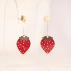 These whimsical Strawberry Earrings are lightweight with sweet screen-printed details and delicate 22K gold-plated accents. These darling earrings are reminiscent of sun-kissed berries glistening in the morning dew. They were inspired by our very own Strawberry patch that thrived this past summer! Handcrafted with meticulous attention to detail, these lightweight earrings are not just accessories; they are a celebration of the beauty found in the simplest elements of nature. DETAILS: 2.6” tall a Nature Details, Strawberry Earrings, Ceramic Accessory, Strawberry Patch, Calendar Gifts, Morning Dew, Elements Of Nature, Lightweight Earrings, Light Weight Earrings