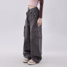 Introducing the Mystic Gray Gothic Cargo Pants - the perfect blend of comfort and style. These versatile pants feature a relaxed wide leg design, multiple pockets, and a fold over waistband style. Crafted from soft and durable broadcloth material, they are suitable for any occasion. Upgrade your wardrobe with these trendy and chic pants that embody both comfort and style. Relaxed wide leg design Multiple pockets Fold over waistband style Crafted from soft and durable broadcloth material Streetwear Full Length Harem Pants With Cargo Pockets, Streetwear Full-length Harem Pants With Cargo Pockets, Streetwear Harem Pants With Cargo Pockets, High Waist Cotton Cargo Pants For Fall, Baggy Wide-leg Cargo Pants With Side Pockets, High Waist Cotton Parachute Pants For Fall, Spring Cargo Style Wide Leg Harem Pants, Wide Leg Cotton Pants With Belt Loops For Fall, Cotton Wide Leg Pants With Belt Loops For Fall