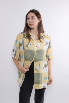 Hi! This is vintage yellow color short sleeves blouse with buttons closure and flowers pattern. This button front shirt made of  VISCOSE. The model in the photo is 170 cm tall and is wearing a LARGE size blouse.   D/NL 44; F/B 46; GB 18 - sizes on the tag. But, be careful, this is a vintage size, it is better to check the measurements below in the product description. Sleeve - 14cm / 5.51inch;  Width - 60cm / 23.62inch;  Length - 72cm / 28.34inch. All measurements are taken seam to seam while ly Spring Printed Hawaiian Short Sleeve Shirt, Yellow Button-up Hawaiian Shirt For Spring, Yellow Spring Button-up Hawaiian Shirt, Spring Short Sleeve Shirt With Floral Print, Short Sleeve Shirt With Floral Print For Spring, Floral Print Short Sleeve Shirt For Spring, Yellow Short Sleeve Hawaiian Shirt For Summer, Yellow Printed Short Sleeve Hawaiian Shirt, Yellow Collared Hawaiian Shirt For Spring