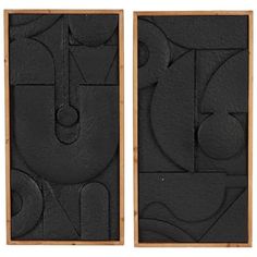 two black and white abstract paintings in wooden frames on a white background, each with an individual's own artwork