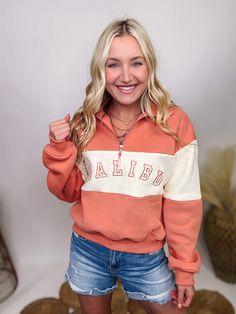 Women's Malibu Coral and Ivory Half Zip Collared Pullover Calling all fashionistas! Elevate your casual chic style with our Malibu Coral and Ivory Half Zip Collared Pullover. For those who value both style and comfort, this pullover stands out with its chic half zip design and classic collared neckline. Perfect for everyday wear, whether you're running errands, lounging at home, or enjoying outdoor activities. Pair it with your favorite jean shorts, our buttery soft skort or even leggings for a College Retro Sweatshirt, Retro Cream Top For Fall, Zip Design, Zip Collar, Casual Chic Style, Favorite Jeans, Half Zip, Running Errands, Casual Chic