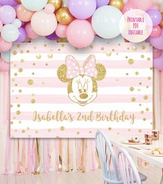 a pink and gold minnie mouse birthday party backdrop