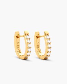 Deck out your ears with our newest iced out hoops. Our gold Studded Huggie Earrings have sparkling diamond simulants and sit close to the ear for a sleek fit. These trendy Huggies are here to stay. Huggie Earrings Gold, Sparkling Diamond, Diamond Simulant, Huggie Earrings, Mens Gold, Sparkle Diamonds, Gold Studs, Huggies Earrings, Gold Earrings