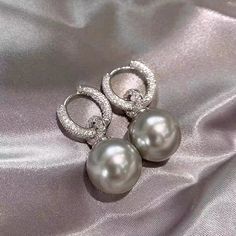 PRODUCT SPECIFICATIONS: Pearl Type: ShellPearl Shape: RoundPearl Size: 13MMPearl Color: White, GaryStock Number: 7437Metal: 14K Gold or14K White Gold plated and S925 Silver PinsFor: FemaleWeight: 3g Pearl Clasp, Silver Pin, Pearl Types, Diamond Gold, Pearl Grey, Pearl Color, Pearl Size, Pearl Drop Earrings, Pearl Drop