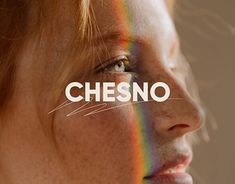 a woman's face with the word chesno painted on it in front of her