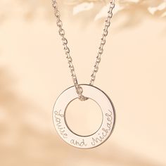 Our Eternity Necklace is beautifully simple and contemporary in design, creating the perfect personalized engraved necklace to capture those special connections in life.18K Champagne Gold Plated, 925 Sterling Silver or 18K Rose Gold PlatedPendant size: 1.4Charms are removable from this chain and can be worn on all Merci Maman chain lengthsEngraved by hand in our workshopSent with love from Paris in a complimentary gift boxAny slight variations in lettering depth, spacing and alignment from the e Sterling Silver White Gold Jewelry With Engraved Text, Sterling Silver Necklace With Engraved Text For Anniversary, Elegant Sterling Silver Jewelry With Engraved Text, Minimalist Sterling Silver Jewelry With Engraved Text, Minimalist Round Jewelry With Engraved Text, Minimalist Necklace With Engraving Option For Anniversary, Sterling Silver Pendant Jewelry With Engraved Text, Sterling Silver Round Pendant With Engraved Text, Sterling Silver Jewelry With Engraved Text On Round Pendant