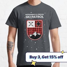 a man wearing a shirt that says ski patrol