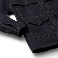 Our new Lined Denim Cruiser Jacket is a tough variant of our 1914-patented classic. It fuses the utility of our multi-pocket forestry jacket with the historic fabric that earned a reputation for toughness in the mid-1800s gold rush. The interior is lined with a special wool blend for added warmth. The preshrunk raw denim will develop its own unique fade and wear pattern, telling the story of rugged use over the years. Snap- front and-adjustable cuffs. Corduroy-lined collar. | Filson Lined Denim Cruiser Jacket Raw Indigo Size Small Utility Denim Jacket With Flap Pockets For Winter, Rugged Long Sleeve Denim Jacket With Pockets, Outdoor Denim Jacket With Patch Pockets And Long Sleeves, Dark Wash Rugged Outerwear With Pockets, Rugged Dark Wash Outerwear With Pockets, Utility Denim Jacket With Flap Pockets, Utility Style Denim Jacket With Pockets For Outdoor, Utility Denim Jacket With Pockets For Outdoor, Rugged Utility Jacket With Flap Pockets For Work