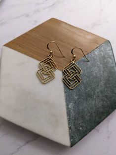 Gold Geometric Metal Jewelry, Geometric Brass Earrings For Gift, Nickel-free Geometric Gold Jewelry, Gold Geometric Nickel-free Jewelry, Geometric Gold Nickel-free Jewelry, Elegant Yellow Gold Geometric Earrings, Gold Infinity Shaped Metal Jewelry, Hypoallergenic Infinity Earrings For Gift, Elegant Gold Geometric Earrings