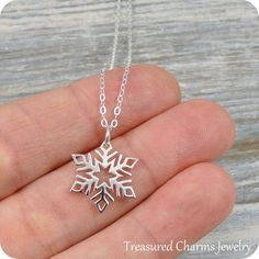 This Snowflake Necklace comes on a sterling silver chain that is available in different lengths. Please choose your desired length from the drop-down menu when placing the item in your shopping cart. { CHARM DETAILS }★ Material: .925 Sterling Silver★ Finish Color: Silver★ Measurements: 1/2" x 5/8"★ Dimensions: Double-sided{ SIMILAR ITEMS } More Christmas themed items available from my shop: https://www.etsy.com/shop/treasuredcharms/search?search_query=christmas{ GIFT OPTIONS}Gift boxes are avail Winter Blizzard, Necklace Snowflake, Snowflake Necklace, Snowflake Pendant, Christmas Necklace, Jewellery Inspiration, Silver Snowflakes, Christmas Jewelry, Sterling Silver Chain