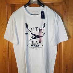 Nautica Tee Shirt Brand New Never Used Or Worn With Tags Retail Value Of $35.00 Will Consider All Reasonable Offers White Short Sleeve Nautical Shirt, Nautical Short Sleeve Cotton Shirt, White Nautical Cotton Shirt, Cotton Nautical Crew Neck Shirt, Mens Red Shorts, Men Crewneck, Mens Tshirts Fashion, Retro Graphic Tees, Shirt Brand