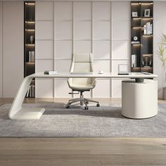 an office with a desk, chair and bookshelf