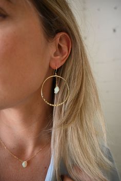 "Timeless, beautiful, feminine earrings you can literally wear with anything. The dainty opals shine and flash in the light! Wear these from day to elevate your everyday look and into the night for that feminine, powerful touch. Opal is the stone of the Spirit, amplifying your aura and all chakras. ▲ Opal gemstones ▲ 2\" gold plated hammered hoops ▲ Weight: 1/4 oz ▲ Handmade in Arizona Love hoop earrings as much as we do? Shop them all here! https://etsy.me/3txKbEn ✦ O R D E R - P R O C E S S I Single 14k Gold Filled Hoop Earring, Delicate Hypoallergenic Hoop Jewelry, Dainty Circle Earrings For Pierced Ears, Dainty Circular Earrings, Single Round Metal Bridal Earring, Solo Round Metal Bridal Earring, Small Hoop Metal Pearl Earrings For Pierced Ears, Teardrop 14k Gold Filled Hoop Earrings For Wedding, 14k Gold Filled Dangle Hoop Earrings For Wedding