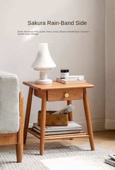 a small wooden table with a lamp on top