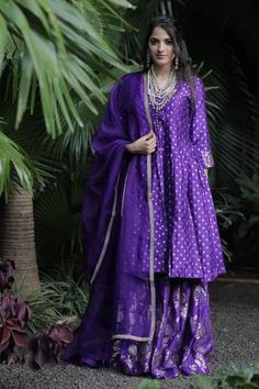 Violet anarkali with brocade printed motifs. Comes with flared pant and sheer dupatta.
Component: 3
Sleeve Length: Three fourth
Fabric: Banarasi Brocade, Organza
Color: Purple
Potli button placket on yoke
Brocade printed floral motifs on pant - Aza Fashions Brocade Anarkali, Sharara Designs, Banarasi Brocade, Women Kurta, Simple Kurta Designs, Long Kurti Designs, Casual Indian Fashion, Pakistani Fashion Party Wear, Beautiful Pakistani Dresses