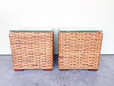 pair of wicker end tables with glass tops