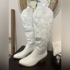 Knee High White Cowboy Boots From Amazon. Never Worn, Perfect Condition. Women’s Size 9. White Knee-high Synthetic Boots, White High-top Mid-calf Boots For Fall, Trendy White Wide Calf Boots, Trendy White Wide Calf Mid-calf Boots, White Leather Mid-calf Casual Boots, Trendy White Pointed Toe Mid-calf Boots, Casual White Leather Mid-calf Boots, White Mid-calf Boots For Winter, Trendy White Round Toe Boots