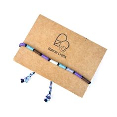 - Purple Haze wrap bracelet - Hand made using cotton thread, this beautiful wristband makes a great gift. With biodegradable materials & packaging, this item is also suitable for vegans and eco-conscious shoppers. Ties to fasten using the braided tails at each end, making the size adjustable. This bracelet will fit most wrists, from about 5.5 inches upwards. (19 cm +) Total length (including tie tails) is approx. 12 inches (30.5 cm) Approx. 0.15 inches wide (0.3 cm) This listing is for one pre-m Biodegradable Materials, Vegan Gifts, Anklet Jewelry, Eco Conscious, Cotton Thread, Boho Jewelry, Body Jewelry, Wrap Bracelet, Anklets