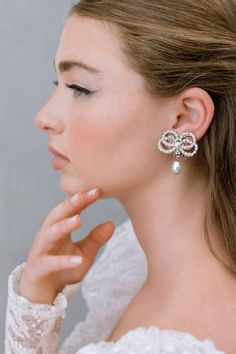 Our Delicacy earrings are subtly luxurious and distinctively feminine. They are embellished with clear and ivory cream crystals, and off-white pearls. Contemporary Bride, Maria Elena, Bridal Event, Classy Women, Modern Bride, Divine Feminine, Bridal Accessories, Pearl White, Headpiece