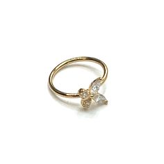 Dainty 14K solid gold nose ring with a CZ butterfly. Bends to the side for insertion .  Width : 0.8mm  Size : 8mmm Material : 14 K solid gold , CZ  Comes in a gift box Elegant Hypoallergenic 14k Gold Nose Rings, Tiny Elegant Gold Nose Rings, Dainty Septum Ring For Wedding, Dainty 14k Gold Nose Ring For Wedding, Elegant 14k Gold Nose Ring As Gift, Minimalist 14k Gold Nose Ring For Wedding, Butterfly Nose Ring, Piercing Nose Ring, Nose Ring Jewelry