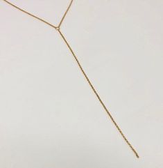 This long drop lariat is made from a delicate rolo chain. The chain is 14k gold fill, 14k rose gold fill, or sterling silver chain. The drop chain of the necklace measures 6 inches. If you want a longer or shorter drop chain, let me know in the comment section. The drop chain length is not included in the necklace length. LENGTH - Necklace on the model is 22 inches (the model's neck circumference is 12 inches). YOUR ORDER - Choose either gold fill or sterling silver in the drop-down menu. - Sele 14k Gold Filled Lariat Necklace For Gift, Minimalist Lariat Chain Necklace, Rose Gold Lariat Chain Necklace With Adjustable Chain, Adjustable Rose Gold Lariat Necklace, Delicate Drop Chain Necklace Gift, Rose Gold Lariat Necklace With Delicate Chain, Minimalist Y-shape Adjustable Chain Necklace, Rose Gold Long Drop Jewelry, Minimalist Lariat Drop Necklace With Adjustable Chain