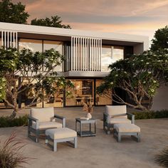 an artist's rendering of a modern house with outdoor furniture and trees in the foreground