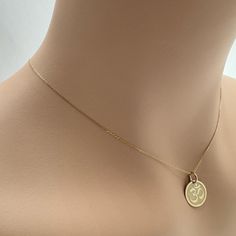 ♥ Necklace Material: Solid gold 14k (REAL GOLD)  ♥ Metal Stamp: 585 (For 14k) ♥ Pendant Thickness: 0,5 mm ♥ In the photos the size of the pendant is 12,7 mm / 0.5 inches Diameter & the Chain Thickness is the No.1: 0,7mm ♥ Pendant Dimensions is available in 3 sizes:  - 12,7 mm / 0.5 inches - 15,3 mm / 0.6 inches - 19,1 mm / 0.75 inches ♥ Dime Dimensions (used in some photos for size comparison): 17.91 mm / 0.70 inches  ♥ Chain Thickness Options: - Chain Thickness No.1 : thickness 0,7mm - Chain Th Ohm Necklace, Om Necklace, Size Comparison, Necklace Dainty, Metal Stamping, Real Gold, Personalized Custom, No. 2, Custom Jewelry