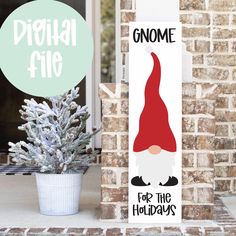 a sign that says digital file gnome for the holidays next to a potted christmas tree