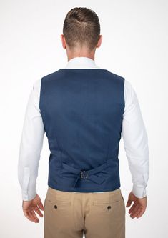 Experience classic styling and modern finesse wearing the Prussian Blue Pinstripe vest. Featuring a vibrant blue hue with subtle pinstripes, this custom made vest will make you feel vibrant and confident. Classic Navy Sleeveless Vest, Fitted Navy Sleeveless Vest, Tailored Pinstripe Sleeveless Vest, Pinstripe Tailored Sleeveless Vest, Tailored Sleeveless Pinstripe Vest, Elegant Blue Business Vest, Classic Fitted Navy Vest, Classic Navy Fitted Vest, Navy Fitted Classic Vest