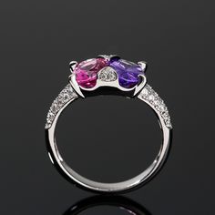 three stone ring with white gold and diamonds