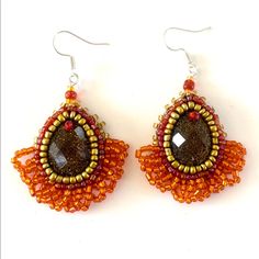 Super Cute Artisan Hand Beaded Earrings. Perfect Bling For Any Season And Occasion. All Beads Are Hand Stitched Not Glued. Orange Teardrop Jewelry With Colorful Beads, Amber Beaded Dangle Earrings, Amber Beaded Drop Earrings, Orange Teardrop Beaded Earrings For Gift, Orange Teardrop Beaded Earrings As Gift, Orange Faceted Beads Dangle Earrings, Orange Teardrop Beaded Earrings With Ear Wire, Orange Teardrop Beaded Earrings, Orange Beaded Earrings As A Gift