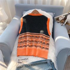 Style: commuting Size: one size Color: blue, orange Trendy Knitted Tank Top For Fall, Winter Orange Sleeveless Vest, Casual Orange Sleeveless Sweater Vest, Orange Sleeveless Winter Vest, Trendy Knitted Winter Vest, Orange Sleeveless Top For Winter, Trendy Knitted Vest For Fall, Sweater Vest Women, Knit Vest