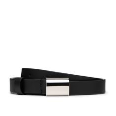 G. Label by goop Slim Belt in Black/Silver, XS/M: Measuring three quarters of an inch wide, this waist-cinching accessory is made in Italy from smooth, scratch-resistant leather and embellished with a sleek, mirrored buckle for a sophisticated finish.100% leather Made in Italy. Slimmer Belt, Cinched Waist, Black Belt, Black Silver, In Italy, Sleek, Buckle, Women Accessories, Italy