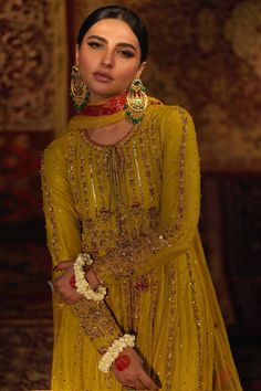 Azal (100% Advance Payment)– Zaaviay Pakistani Dholki Outfit, Gold Sharara In Raw Silk With Intricate Embroidery, Gold Intricate Embroidered Raw Silk Sharara, Gold Raw Silk Sharara With Intricate Embroidery, Gold Raw Silk Sets With Intricate Embroidery, Hand Embellished Party Wear Salwar Kameez For Festive Occasions, Gold Sets With Intricate Embroidery In Raw Silk, Gold Sharara With Intricate Embroidery For Eid, Elegant Sharara With Gold Embroidery For Festive Occasions