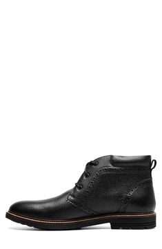 Equipped with a removable pressure-absorbing cushioned insole, this polished-leather chukka boot brings considerate comfort and style to your wardrobe. Leather upper/synthetic lining and sole Imported Classic Lace-up Slip-resistant Boots, Classic Slip-resistant Plain Toe Boots, Black High-top Chukka Boots With Leather Sole, Black Chukka Boots With Textured Sole And Plain Toe, Black Leather Ankle-high Chukka Boots, Slip-resistant Lace-up Leather Boots, Black Leather High-top Chukka Boots, Black Chukka Boots With Textured Sole And Round Toe, Black Chukka Boots With Textured Sole