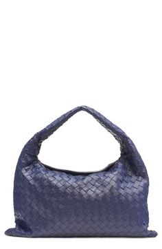 This compact hobo bag with a slouchy silhouette is handwoven from supple calfskin leather using the Italian house's signature intrecciato technique. Magnetic closure Shoulder strap Interior zip pocket Leather Made in Italy Designer Handbags Leather Bucket Bag With Intrecciato Weave For Errands, Luxury Rectangular Hobo Bag With Braided Handles, Luxury Woven Leather Hobo Bag For Daily Use, Designer Shoulder Bag With Rolled Handles For Errands, Luxury Intrecciato Weave Satchel Bucket Bag, Luxury Hobo Bag With Braided Handles For Shopping, Luxury Intrecciato Hobo Bag For Daily Use, Rectangular Leather Hobo Bag With Intrecciato Weave, Designer Hobo Bag With Intrecciato Weave For Shopping