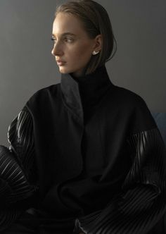 A classic style reimagined, the Black Cocoon Wool Coat is a timeless wrap coat crafted from a versatile wool and cashmere blend. Tailored in a cocoon shape, this wardrobe icon is complete with voluminous pleated sleeves and optional belt fastening and can be worn over layers to effortlessly complete a look.Composition 100% Italian woolSleeves & Belt: 65% polyester, 35% polyurethane (deadstock)Lining: 60% polyester, 40% cottonModel is 180 cm tall and wears M sizeDry clean only.Warm iron inside ou Pleated Sleeves, Fall Layers, Wrap Coat, Women Artisans, Black Coat, Wool Coat, Black Satin, The Black, Creative Design