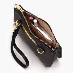 A chic convertible bag that can be worn four ways. Wear it as a crossbody, wristlet, shoulder bag, and even as a belt bag (aka fanny pack). Laptop Tote Bag, Overnight Travel Bag, Slim Leather Wallet, Croc Leather, Convertible Bags, Weekender Tote, Small Wallet, Wallet Accessories, Laptop Backpack