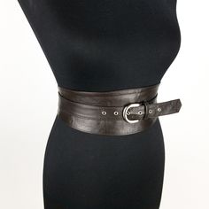 This reversible obi belt made is soft sheep leather. Corset style obi belt creates a flattering feminine shape From the inside, the belt is reinforced with special materials that prevent the stretching of the leather. This beautiful and unique belt combines many different styles: Boho, Steampunk, Gothic, Street style. It all depends on what clothes you will wear it. And you can wear it with any clothes! One thing will remain unchanged: you will not leave anyone indifferent! To order a belt, plea Elegant Fitted Corset Belt For Workwear, Elegant Fitted Corset Belt With Sashes, Chic Fitted Sash Belt, Chic Brown Corset Belt With Self Belt, Chic Fitted Sashes, Chic Fitted Brown Belt, Elegant Fitted Brown Corset Belt, Fitted Black Belts With Sashes, Brown Fitted Corset Belt With Removable Feature