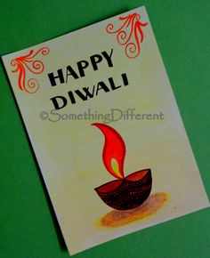 a happy diwali card with a lit candle