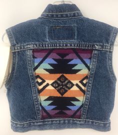 "Pit to pit 12 1/2\"/Length 12\"/Good condition no issues/Discontinued style Camp Wolf no longer carries clothing /Smoke free environment(134)" Retro Blue Denim Vest For Fall, Vintage Cotton Denim Vest For Festivals, Vintage Pre-washed Fall Jeans, Vintage Jeans For Rodeo With Pockets, Vintage Blue Denim Vest, Vintage Blue Denim Vest For Fall, Vintage Blue Denim Jacket For Festival, Vintage Dark Wash Jeans For Rodeo, Vintage Denim Jeans For Rodeo