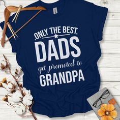 Introducing our heartfelt "Only the Best Dads Get Promoted to Grandpa" T-Shirt! This shirt features a bold, standout design with the touching phrase "Only the Best Dads Get Promoted to Grandpa" in a mix of uppercase block and elegant script fonts. Perfect for Father's Day, a pregnancy announcement, or just to celebrate the special grandpa in your life. Made from soft, high-quality fabric, this T-shirt ensures comfort and durability for everyday wear. Available in various sizes and colors to suit your needs. Show your love and appreciation with this special tee!Product Features:Fabrication: Medium fabric (5.3 oz/yd² (180 g/m²)), 100% cotton (fiber content may vary for different colors)Seams: Without side seamsFit: Classic FitSizing: Family SizingLabel: Tear-away label Promoted To Grandpa, Elegant Script Fonts, Upper Case, Special Promotion, Script Fonts, Personalize Bag, Pregnancy Announcement, Suits You, Cotton Fiber