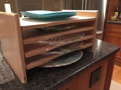 a stack of plates sitting on top of a counter