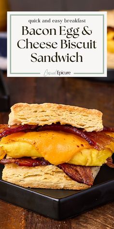 bacon egg and cheese biscuit sandwich on a black plate with text overlay that reads quick and easy breakfast bacon egg and cheese biscuit sandwich sandwich